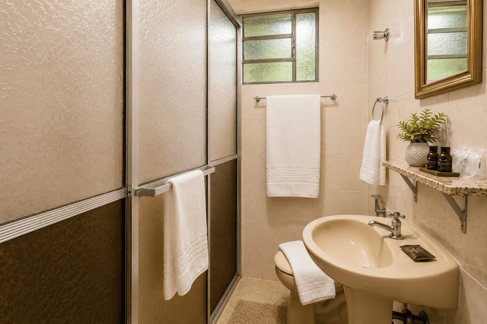 Standard Apartment | Bathroom | Shower, towels, soap, shampoo