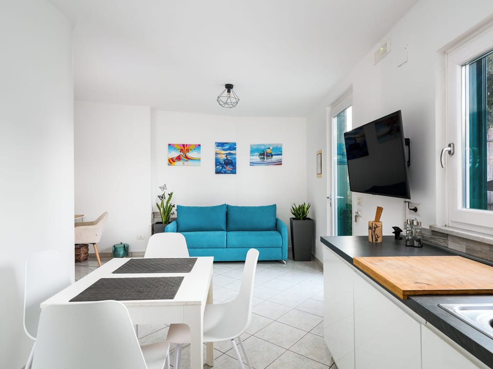 City House | Living area | 40-inch flat-screen TV with digital channels