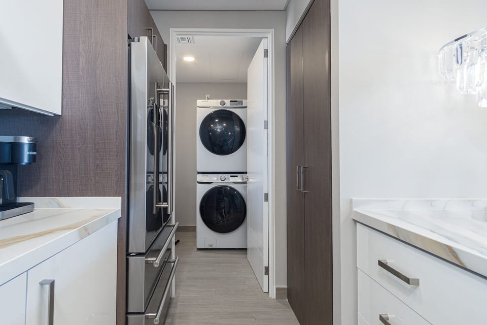 Condo, Multiple Beds, Balcony, Ocean View (Encantame Towers Velero 2204) | Laundry