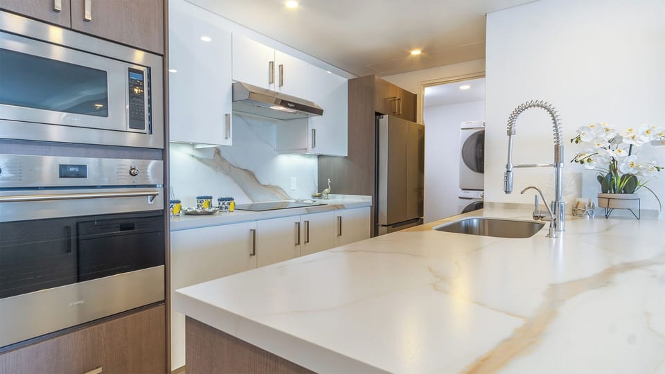 Condo, Multiple Beds, Balcony, Ocean View (Encantame Towers Viento 304) | Private kitchen | Dining table