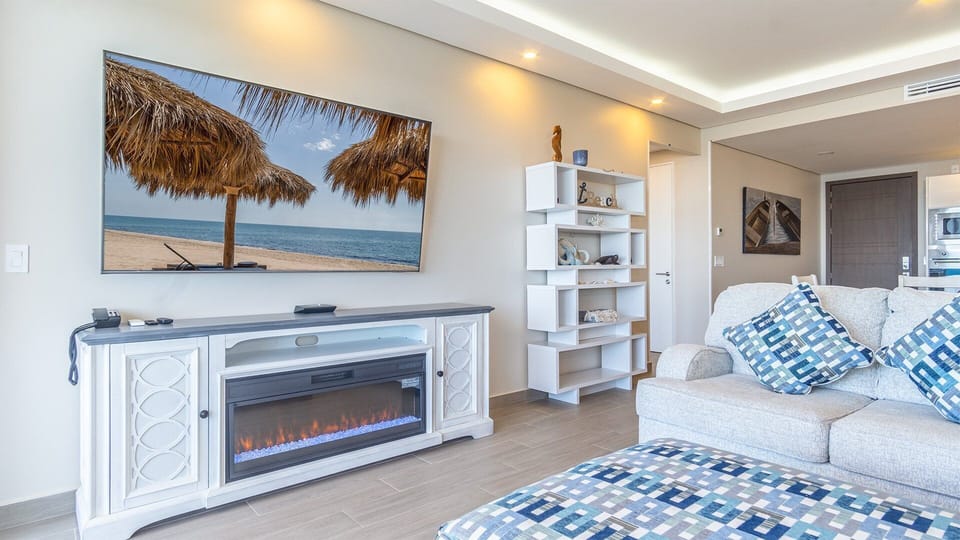 Condo, Multiple Beds, Balcony, Ocean View (Encantame Towers Viento 1404) | Living area | 42-inch flat-screen TV with digital channels