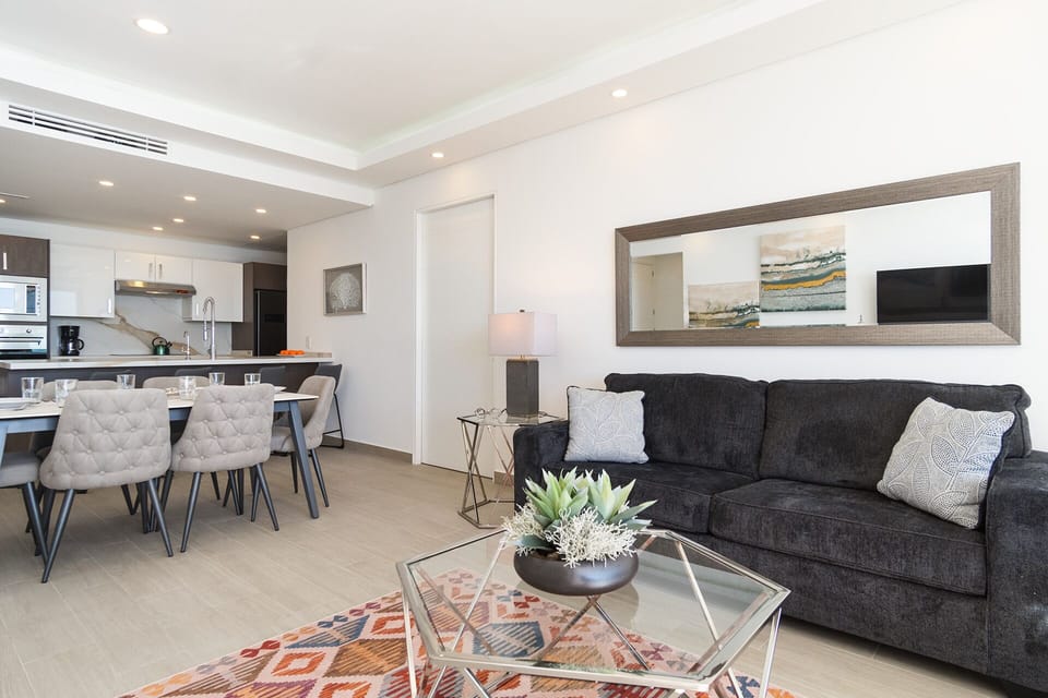 Condo, Multiple Beds, Balcony, Ocean View (Encantame Towers Velero 1102) | Living area | 42-inch flat-screen TV with digital channels