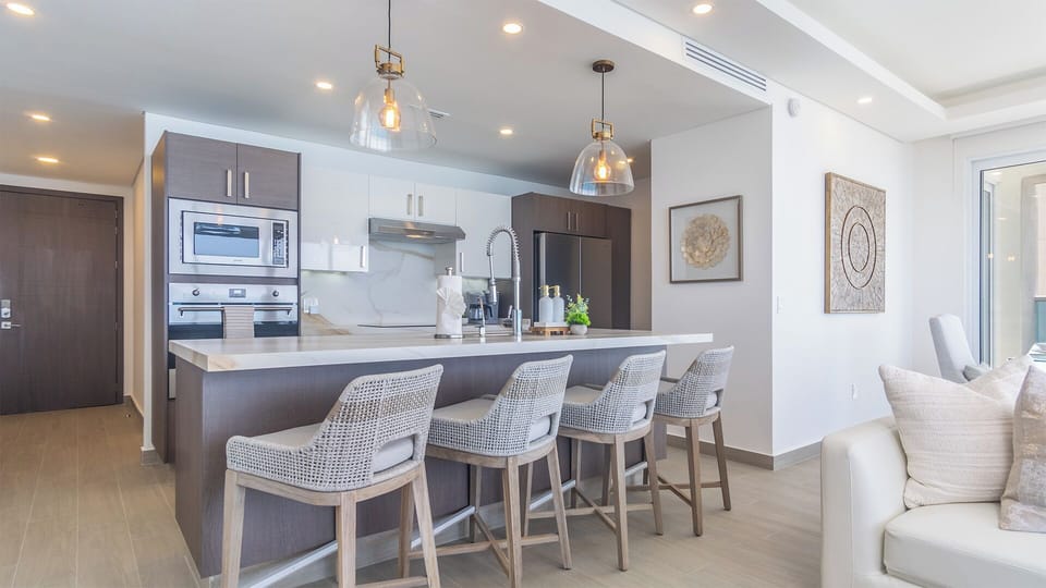Condo, Multiple Beds, Balcony, Ocean View (Encantame Towers Viento 1905) | Private kitchen | Dining table
