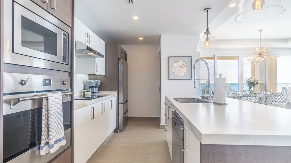 Condo, Multiple Beds, Balcony, Ocean View (Encantame Towers Viento 1905) | Private kitchen | Dining table