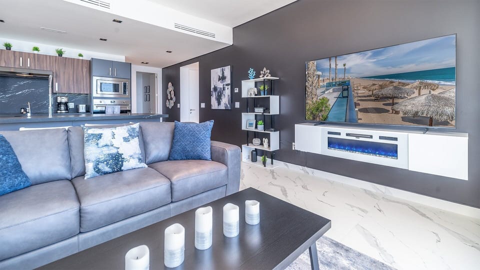 Condo, Multiple Beds, Balcony, Ocean View (Encantame Towers Viento 1702) | Living area | 42-inch flat-screen TV with digital channels