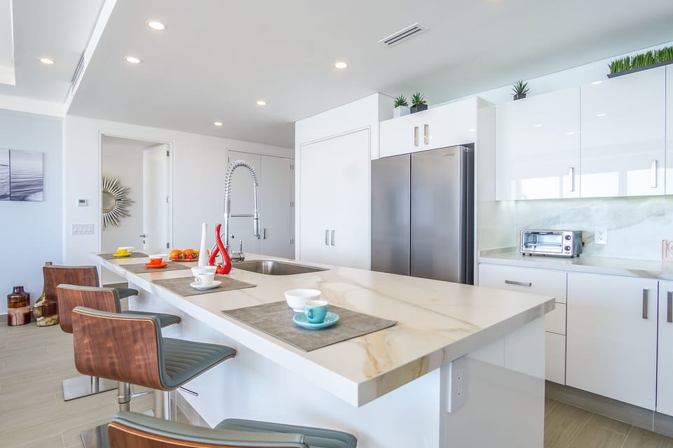 Condo, Multiple Beds, Balcony, Ocean View (Encantame Towers Verano 801) | Private kitchen | Dining table
