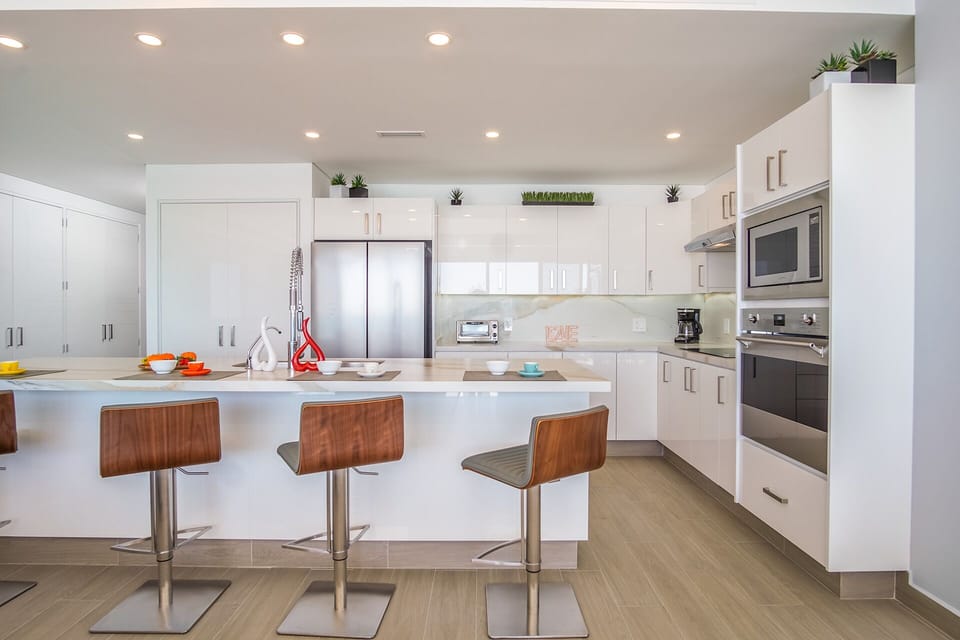 Condo, Multiple Beds, Balcony, Ocean View (Encantame Towers Verano 801) | Private kitchen | Dining table