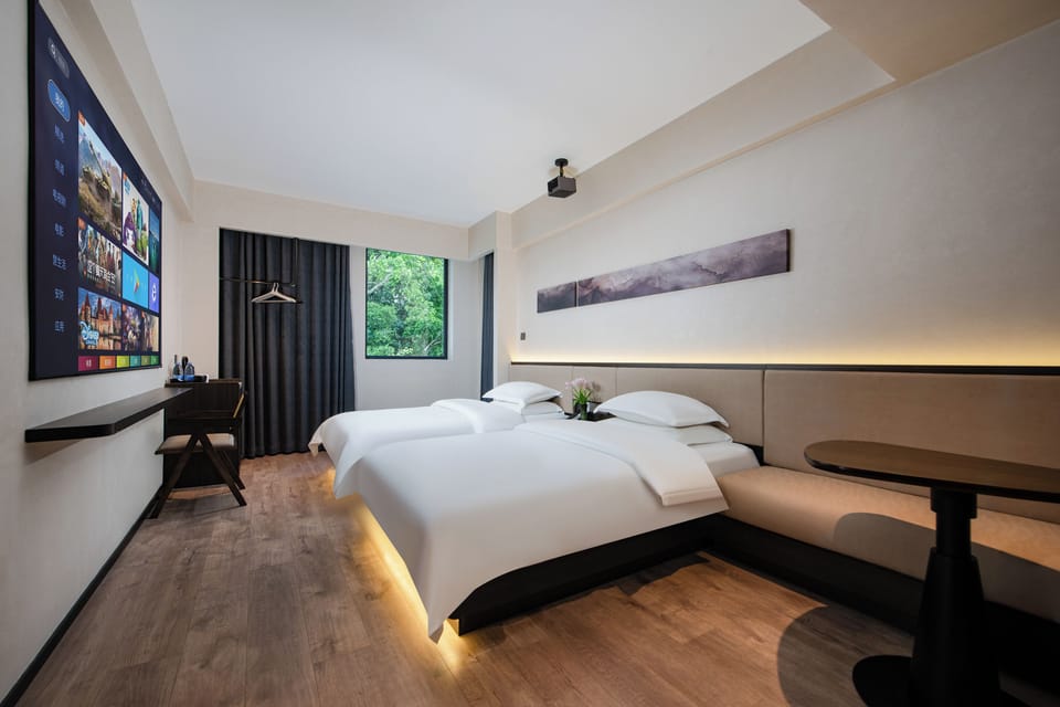 Panoramic Twin Room, Patio, Courtyard View | Hypo-allergenic bedding available, pillowtop beds, minibar, desk