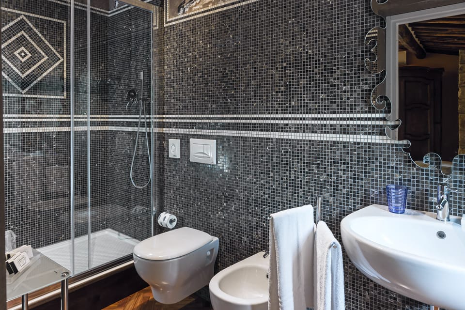 Suite | Bathroom | Hair dryer, bidet, towels