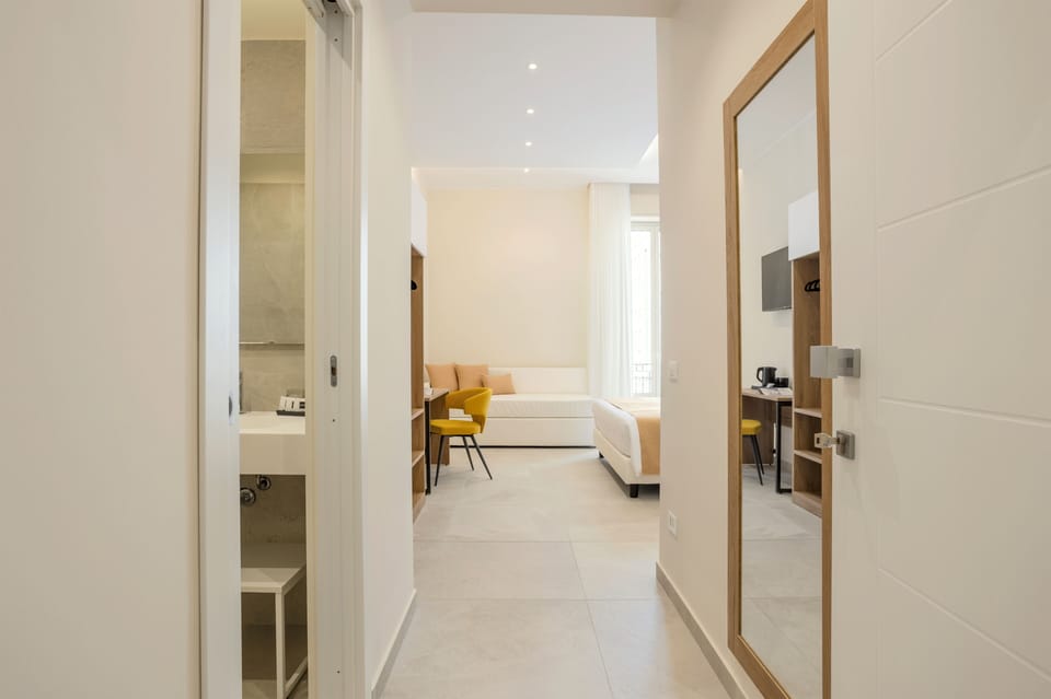 Deluxe Triple Room, Non Smoking, Balcony | In-room safe, individually decorated, individually furnished, desk
