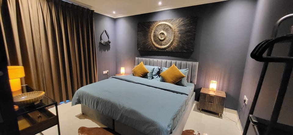 Luxury Quadruple Room, 1 Bedroom, Air conditioning, Garden Area | In-room safe, laptop workspace, blackout drapes, soundproofing