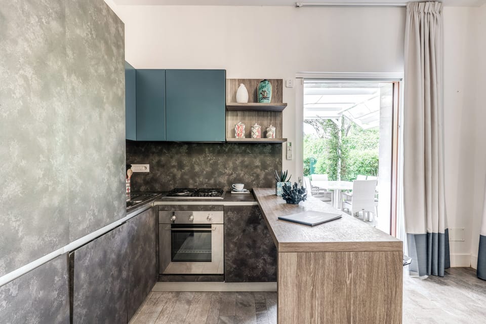 Apartment, Private Pool | Private kitchen | Full-size fridge, microwave, oven, stovetop
