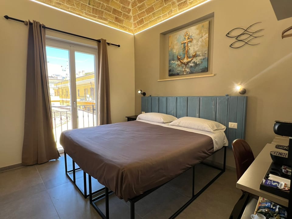 Comfort Double or Twin Room, 1 Queen Bed, Balcony, City View | Down comforters, pillowtop beds, individually decorated, desk