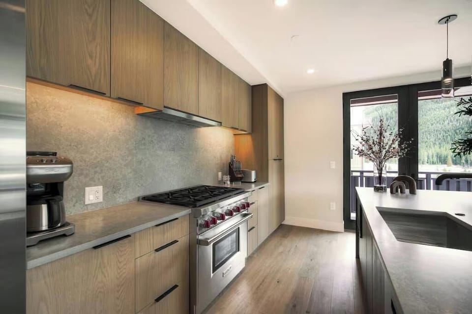 Condo (Kindred Resort Luxury Ski In, Ski Out) | Private kitchen