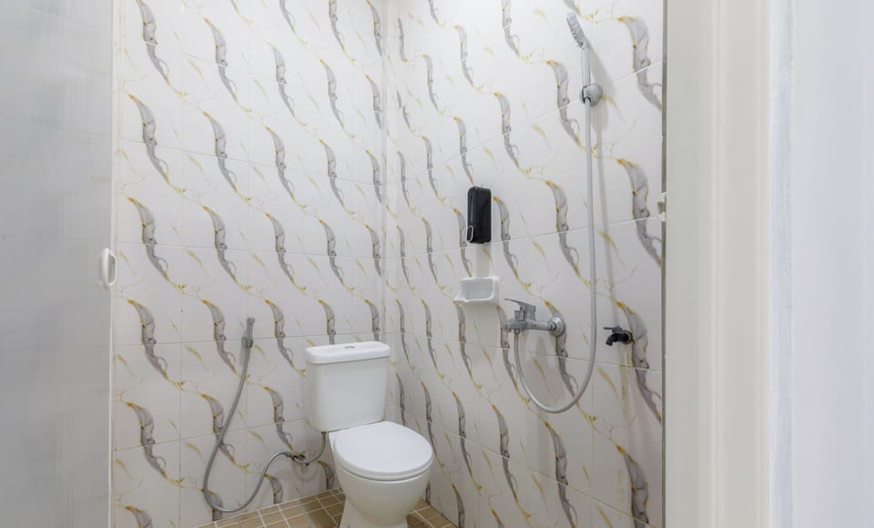 Shower, bathrobes, slippers, bidet