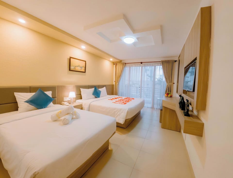 Deluxe Triple Room, Balcony, City View | In-room safe, blackout drapes, free WiFi, wheelchair access