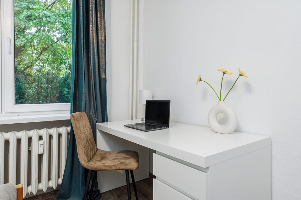 Comfort Apartment, Patio | Desk, laptop workspace, blackout drapes, soundproofing