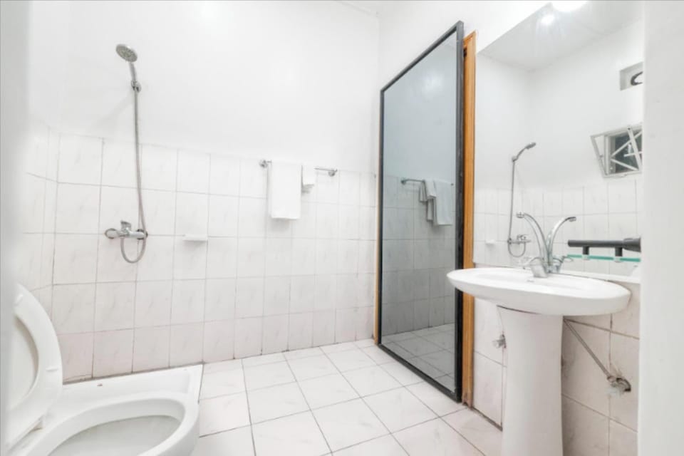 Shower, slippers, towels, soap