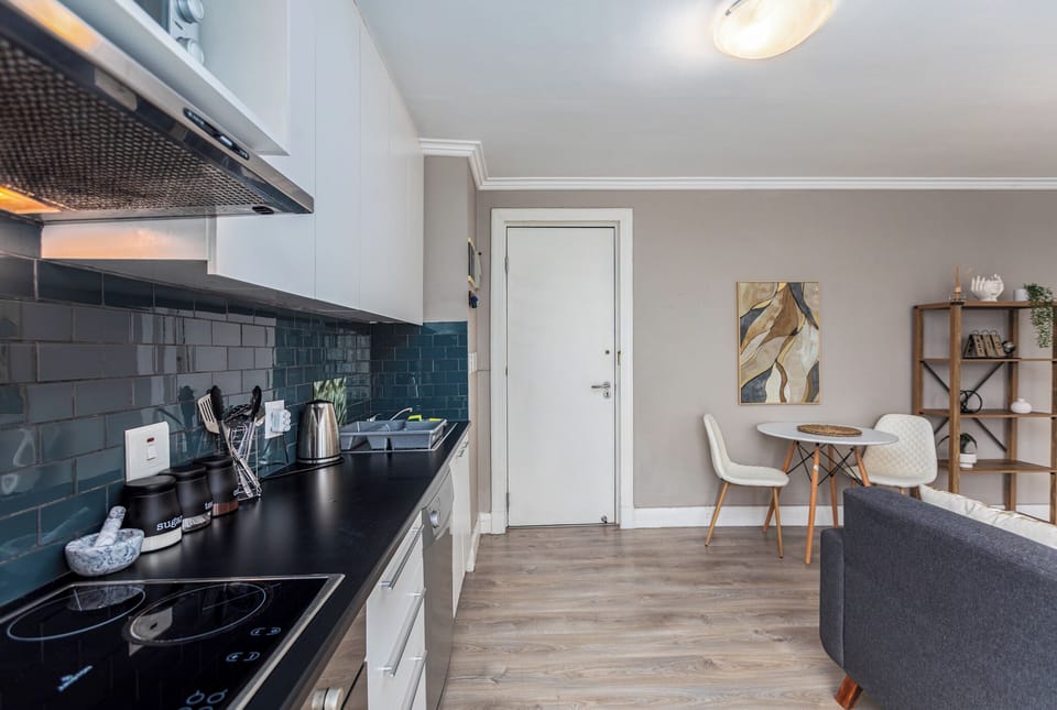 Comfort Apartment | Private kitchen | Full-size fridge, microwave, oven, stovetop