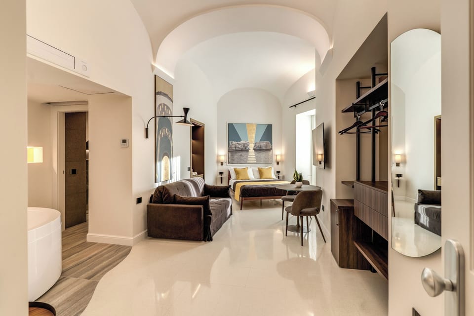 Executive Quadruple Room, Balcony, City View | Desk, laptop workspace, free WiFi