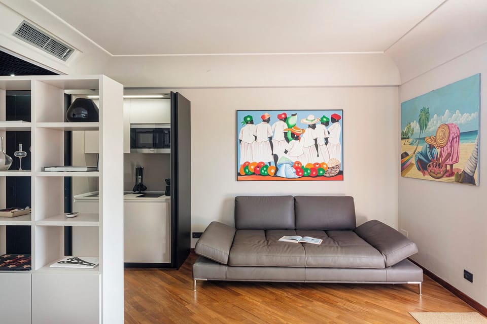 Apartment, 1 Bedroom, Balcony | Living area | 30-inch TV with satellite channels