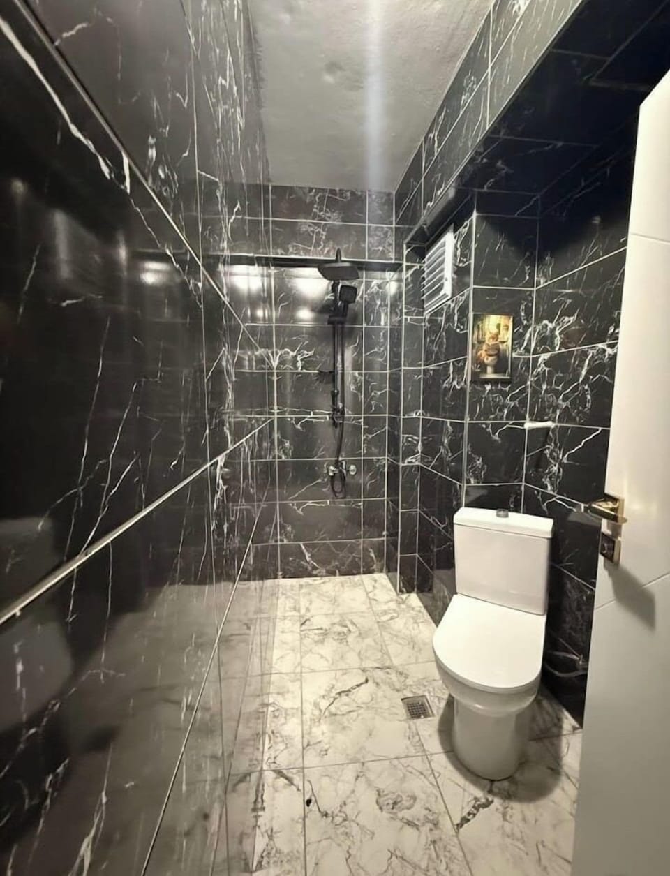 Deluxe Triple Room, City View | Bathroom | Hair dryer, slippers, towels, soap