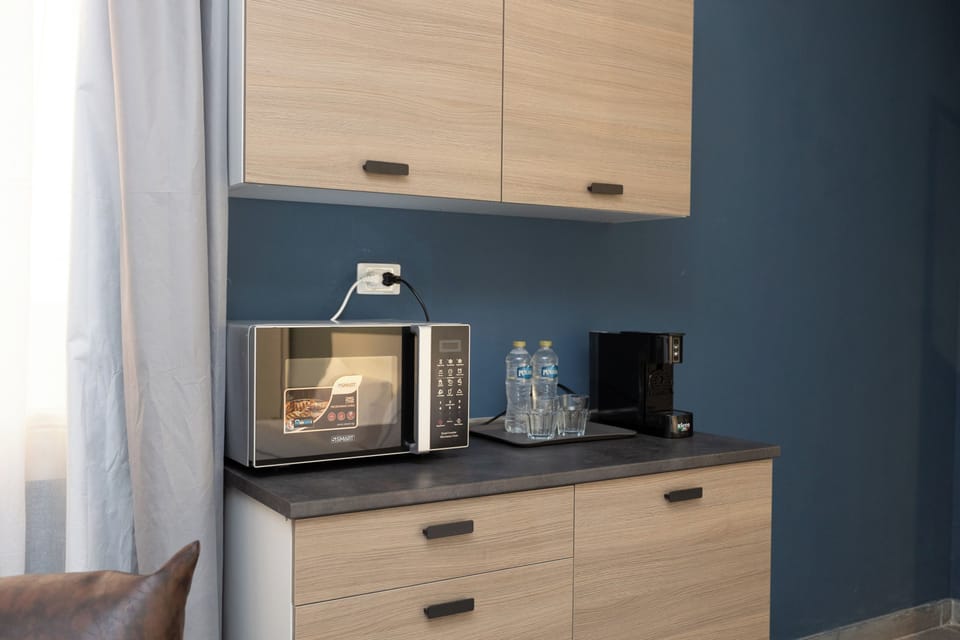 Apartment, Garden View | Private kitchen | Espresso maker, coffee/tea maker, electric kettle