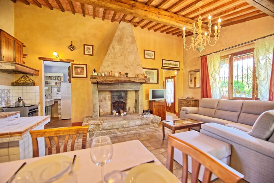 Panoramic Villa, 3 Bedrooms (Casa Cipressi) | Living area | Flat-screen TV, fireplace