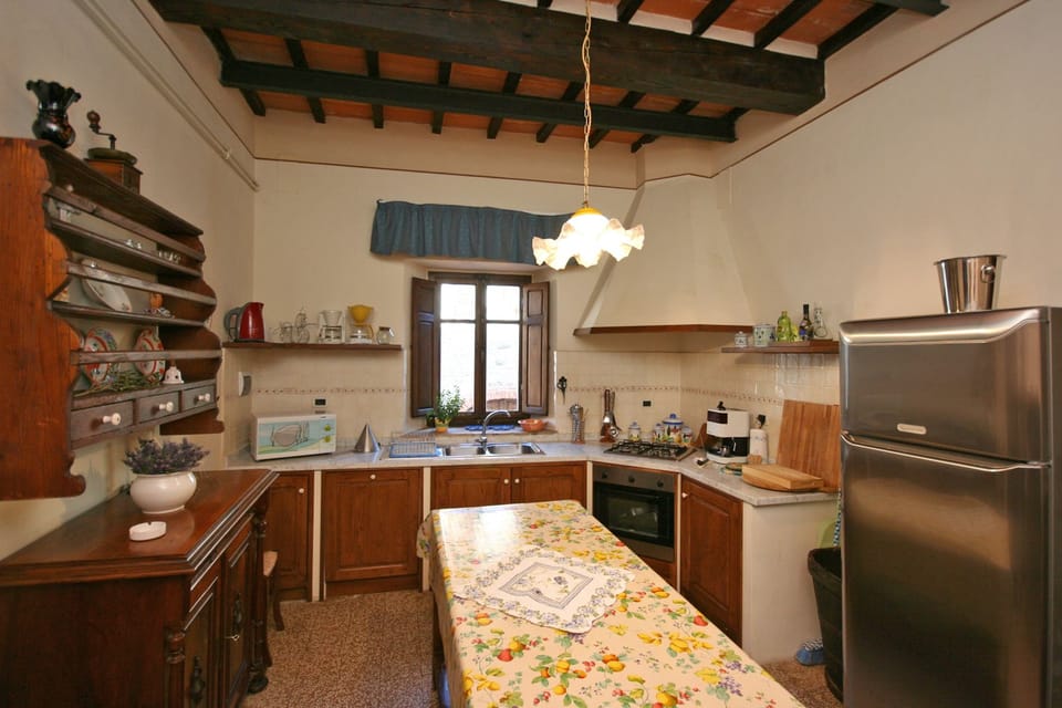 Panoramic Villa, Multiple Bedrooms (Villa Capolona) | Private kitchen | Full-size fridge, microwave, stovetop, coffee/tea maker