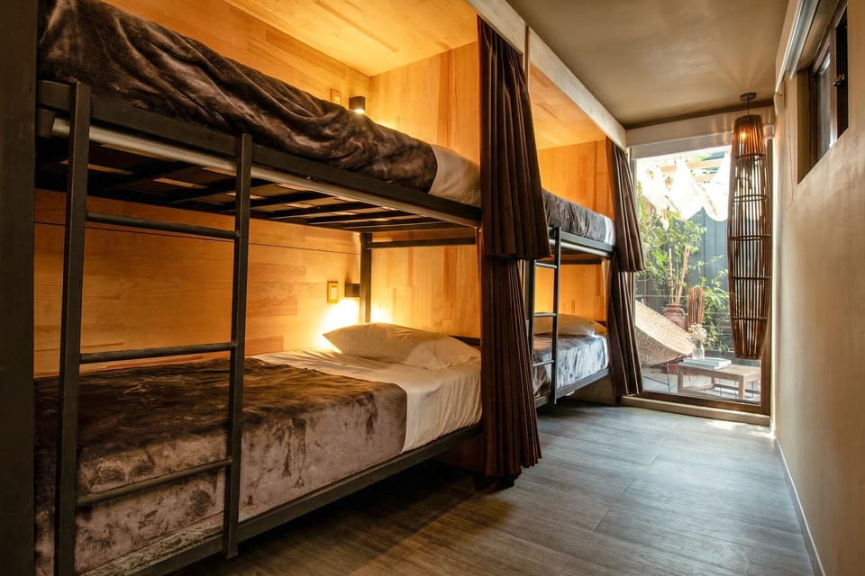 Premium bedding, blackout drapes, iron/ironing board (on request)
