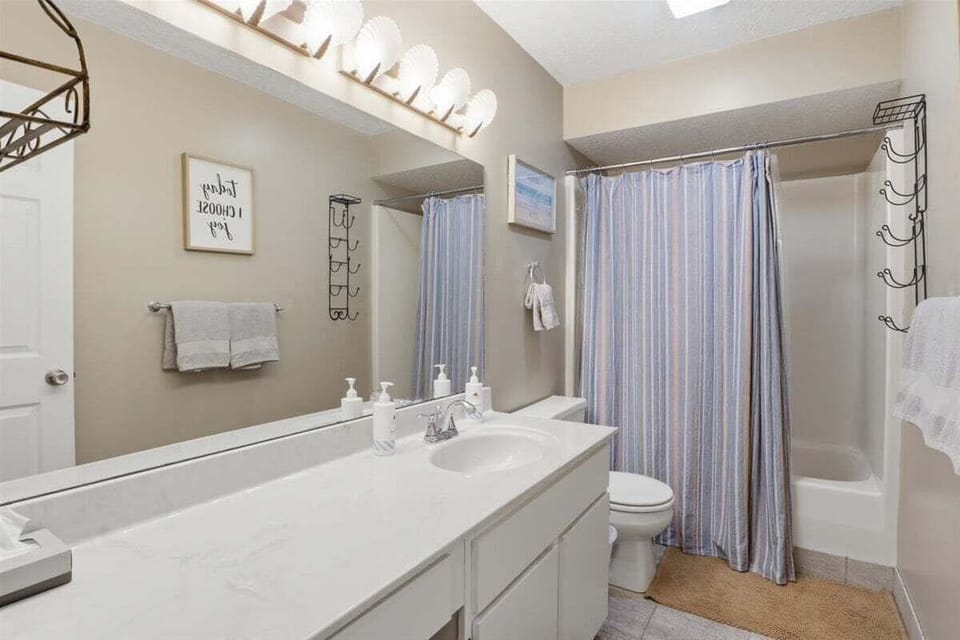 Lakefront Condo With 2 Pools, Courts, Trails & Patios at 12mm Apartment in Village Four Seasons