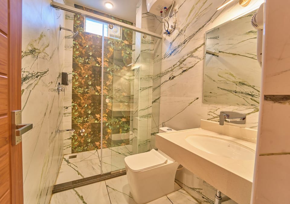 Shower, slippers, bidet, towels