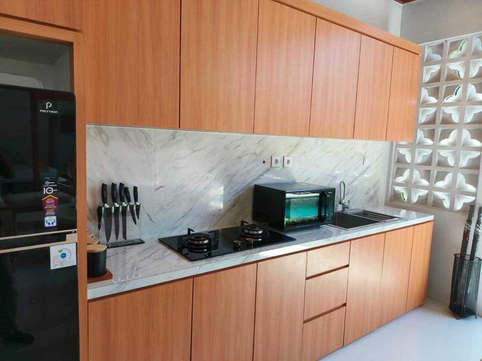 Villa, Non Smoking | Private kitchen | Electric kettle, dining tables