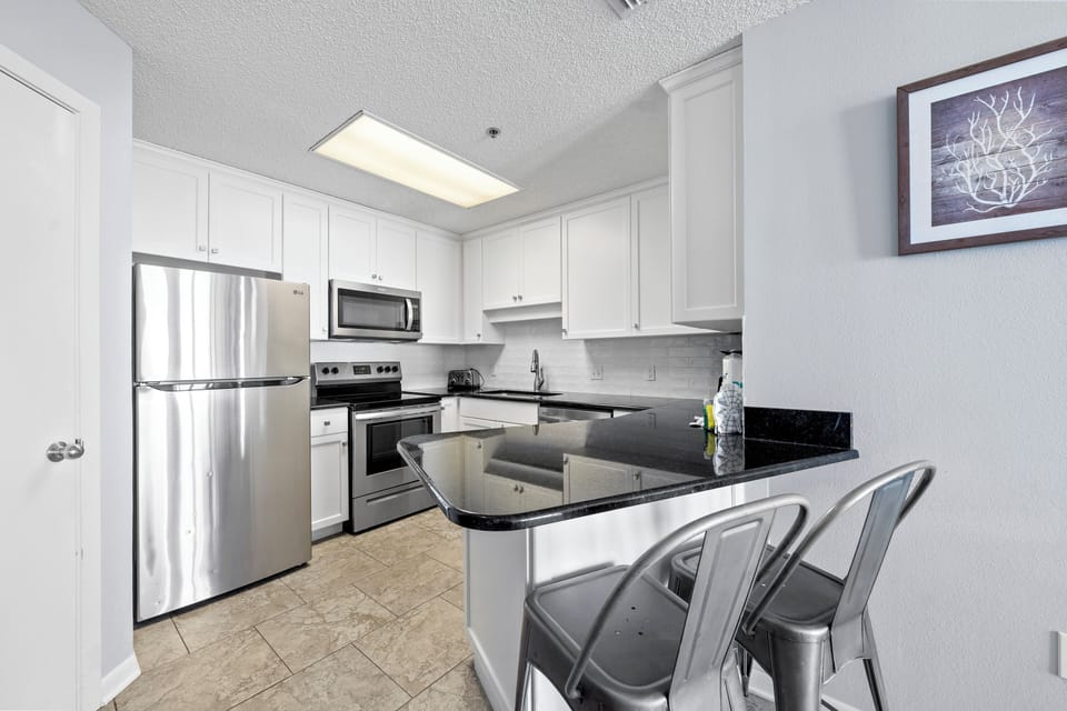 Signature Condo, 2 Bedrooms, Balcony, Beach View | Private kitchen | Fridge, microwave, oven, stovetop
