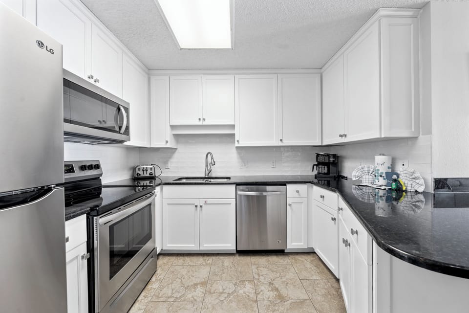 Signature Condo, 2 Bedrooms, Balcony, Beach View | Private kitchen | Fridge, microwave, oven, stovetop