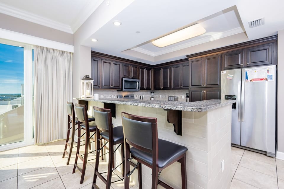 Condo, 4 Bedrooms | Private kitchen | Coffee/tea maker, fridge, oven