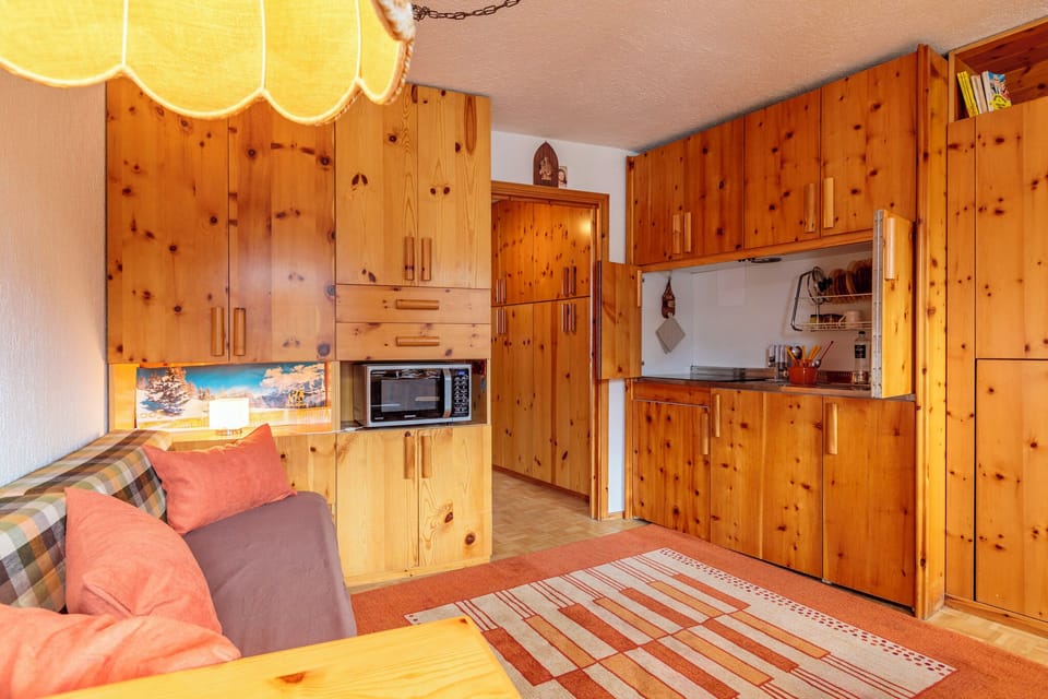 Apartment, Non Smoking, Mountain View | Living area | Flat-screen TV