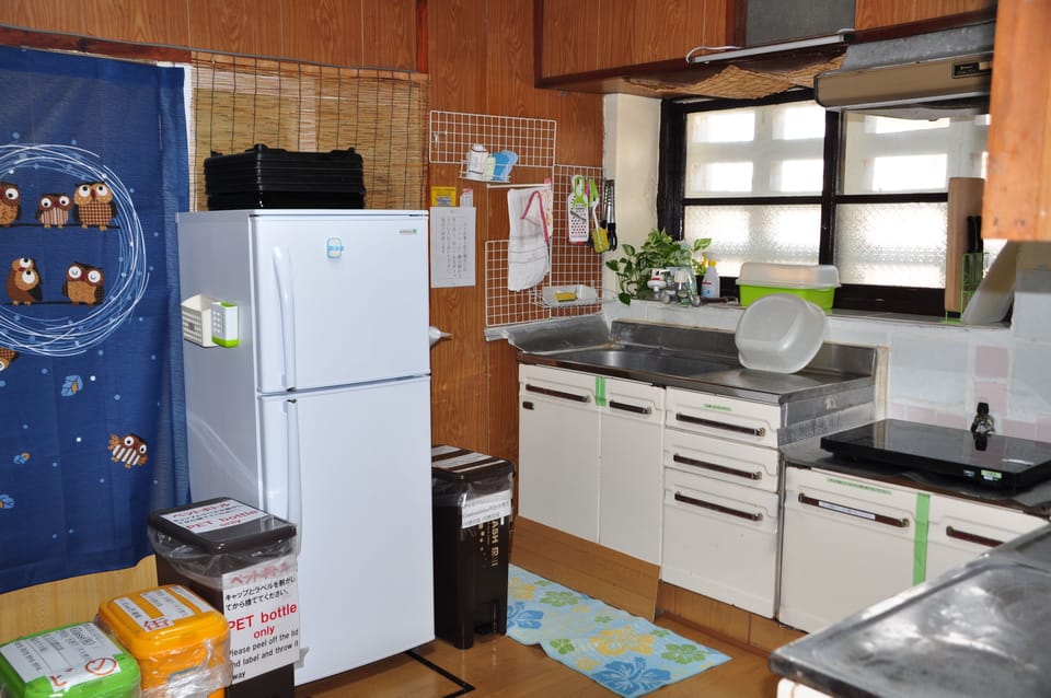 Cottage | Private kitchen | Full-size fridge, microwave, coffee/tea maker, electric kettle