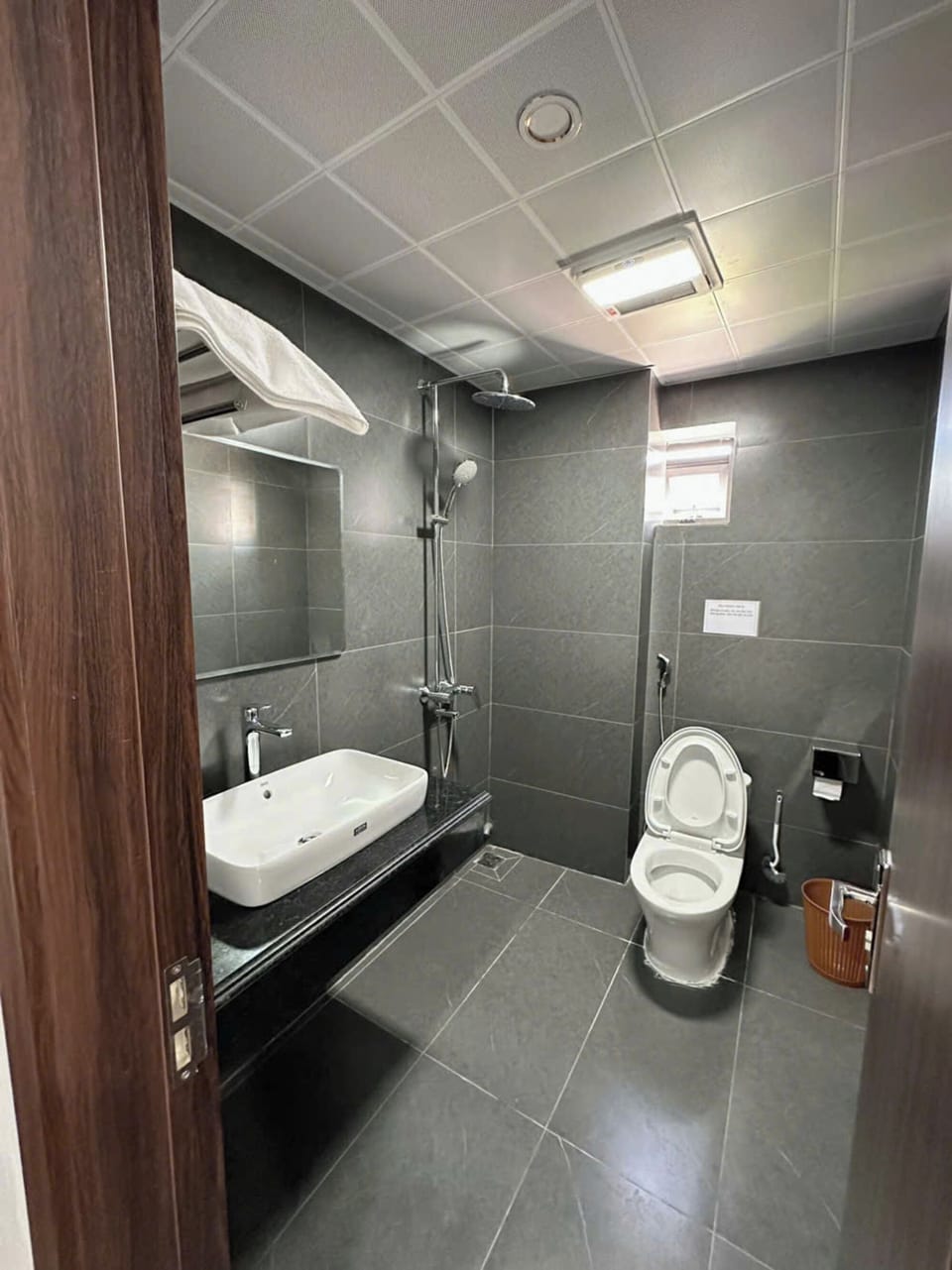 Shower, rainfall showerhead, designer toiletries, hair dryer