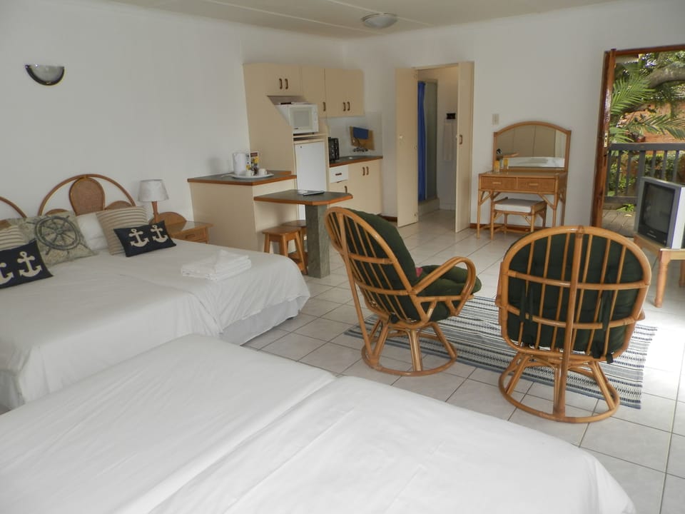 4 Single Bed Semi Self Catering Unit  | Living area | TV