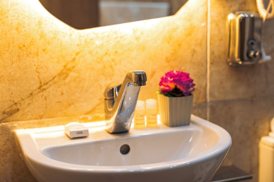 Comfort Triple Room | Bathroom | Shower, designer toiletries, hair dryer, bathrobes