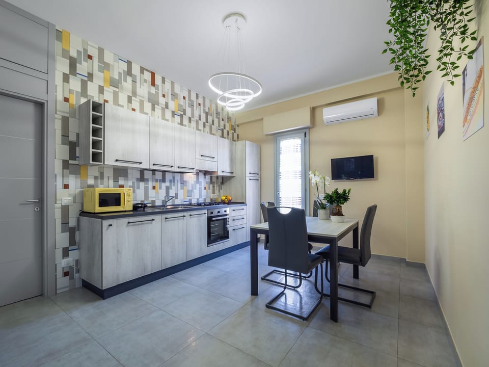 Comfort Apartment, Balcony | Private kitchen | Fridge, microwave, oven, stovetop