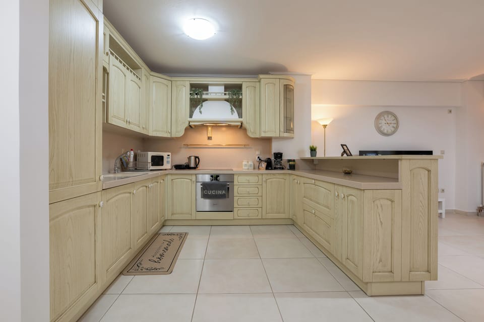 Family Apartment, Balcony | Private kitchen | Microwave, oven, stovetop, electric kettle