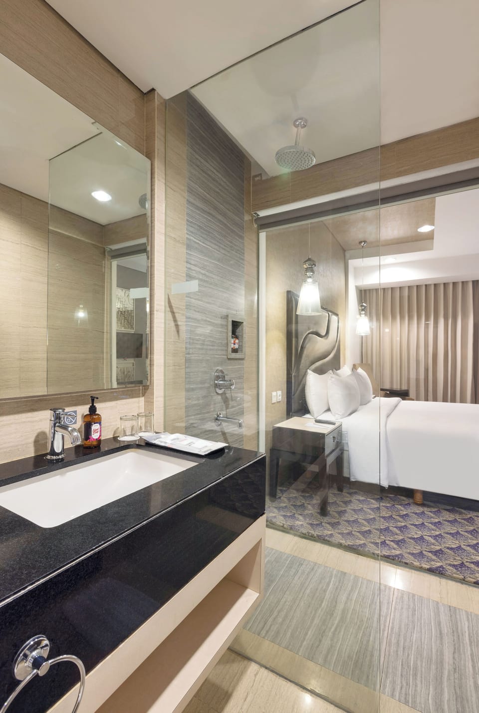 Deluxe Twin | Bathroom | Shower, hair dryer, towels, soap