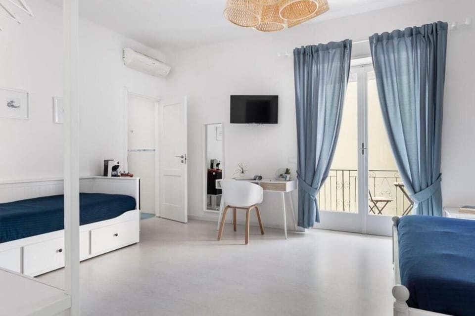 Comfort Quadruple Room, Balcony | In-room safe, soundproofing, iron/ironing board, free WiFi