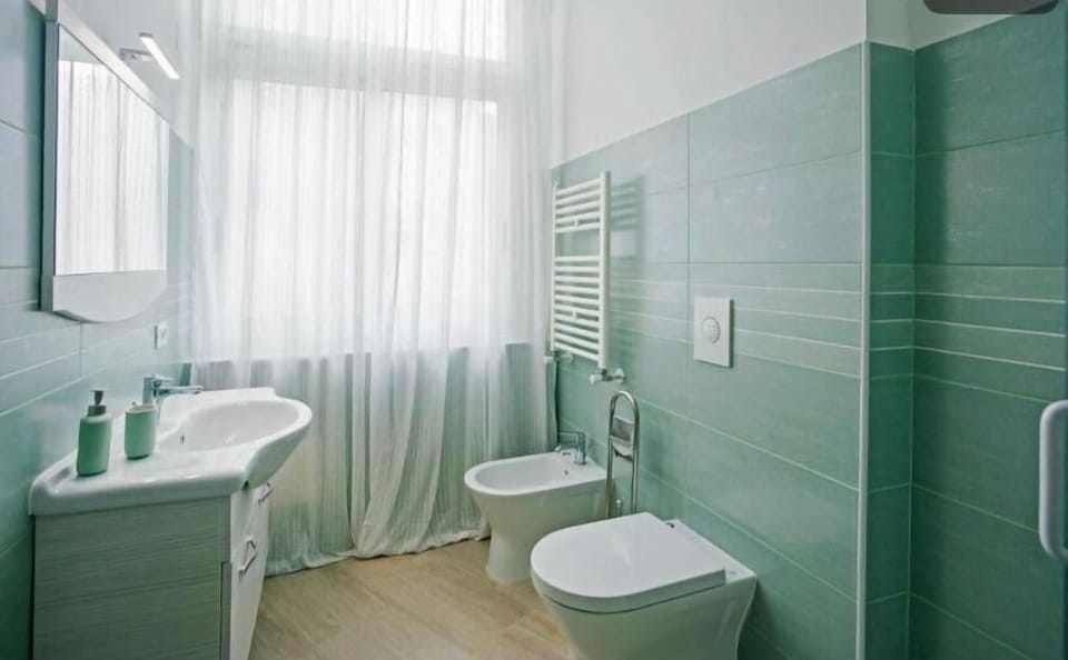 Deluxe Double Room, Balcony, Courtyard View | Bathroom | Bathrobes