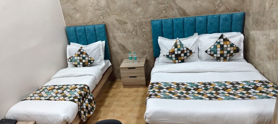 Luxury Triple Room, City View | Desk, laptop workspace