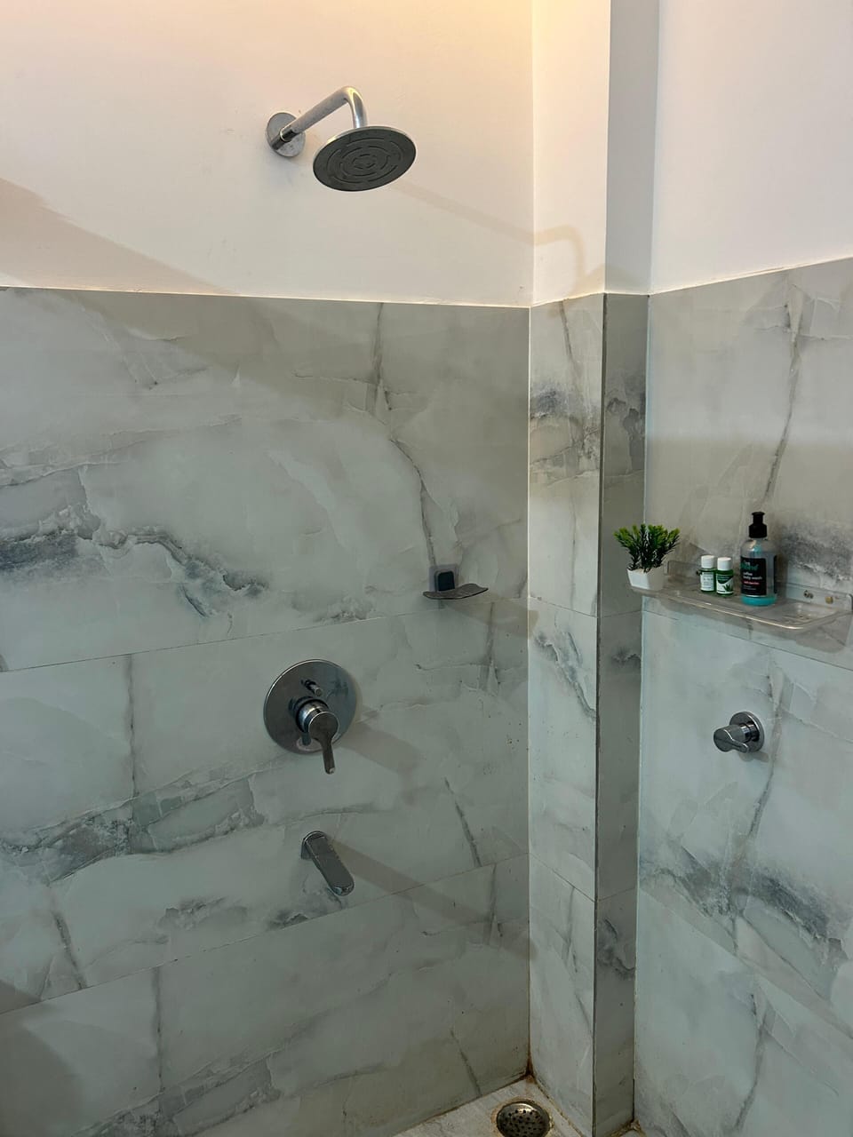 Shower, bathrobes, slippers, towels