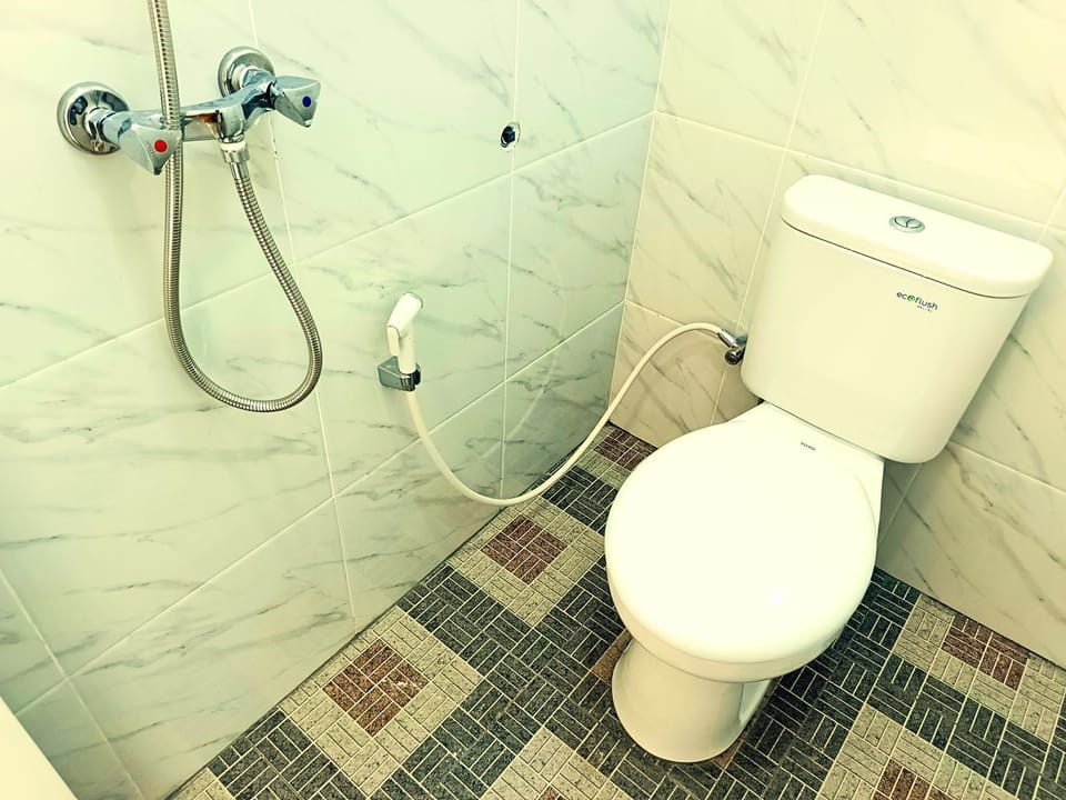 Shower, rainfall showerhead, towels, soap