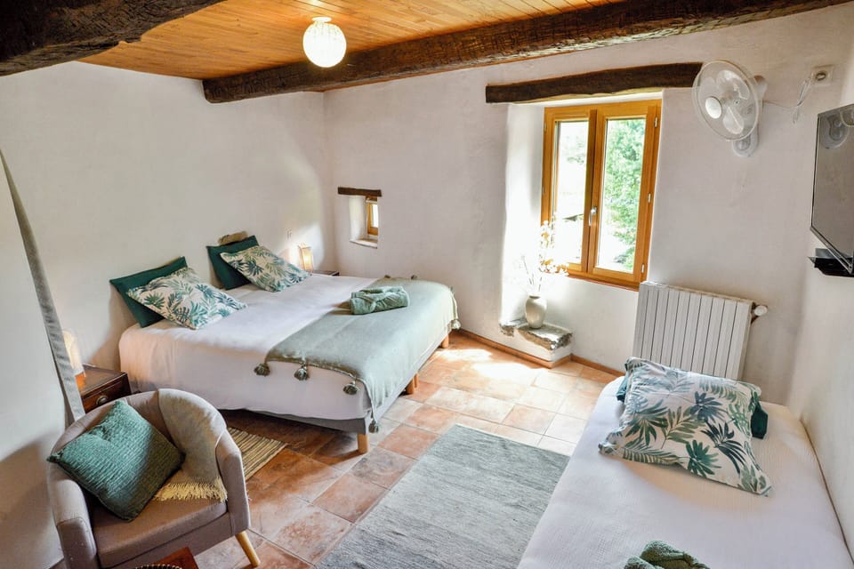 Family Triple Room, Garden View | Premium bedding, memory foam beds, iron/ironing board, travel crib